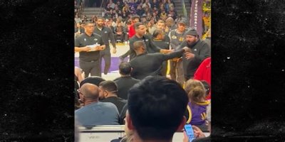 LeBron James Shoves Overzealous Fan Who Rushed Bench